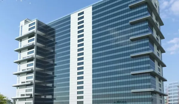 Velankani Tech Park Velankani Tech Park, Bangalore — blue-glass office tower with projecting balcony bays at each end of the elevation